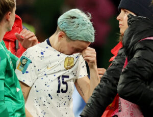 Megan Rapinoe breaks down in tears as USWNT crash out with team-mates left raging at amazing VAR penalty decision | The Sun